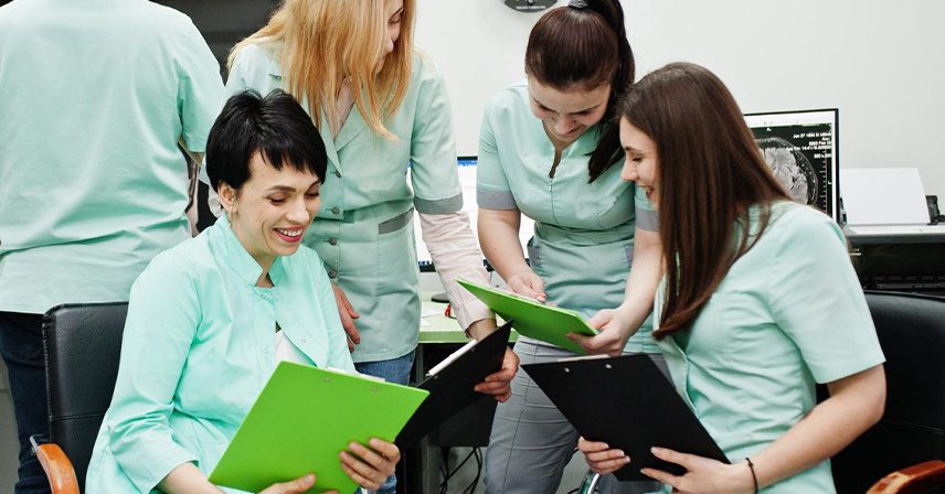 Nursing professionals collaborating on patient care planning